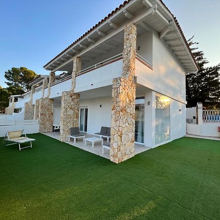 Case Vacanze "Bianco Mare" Porto Pino Exteriör bild