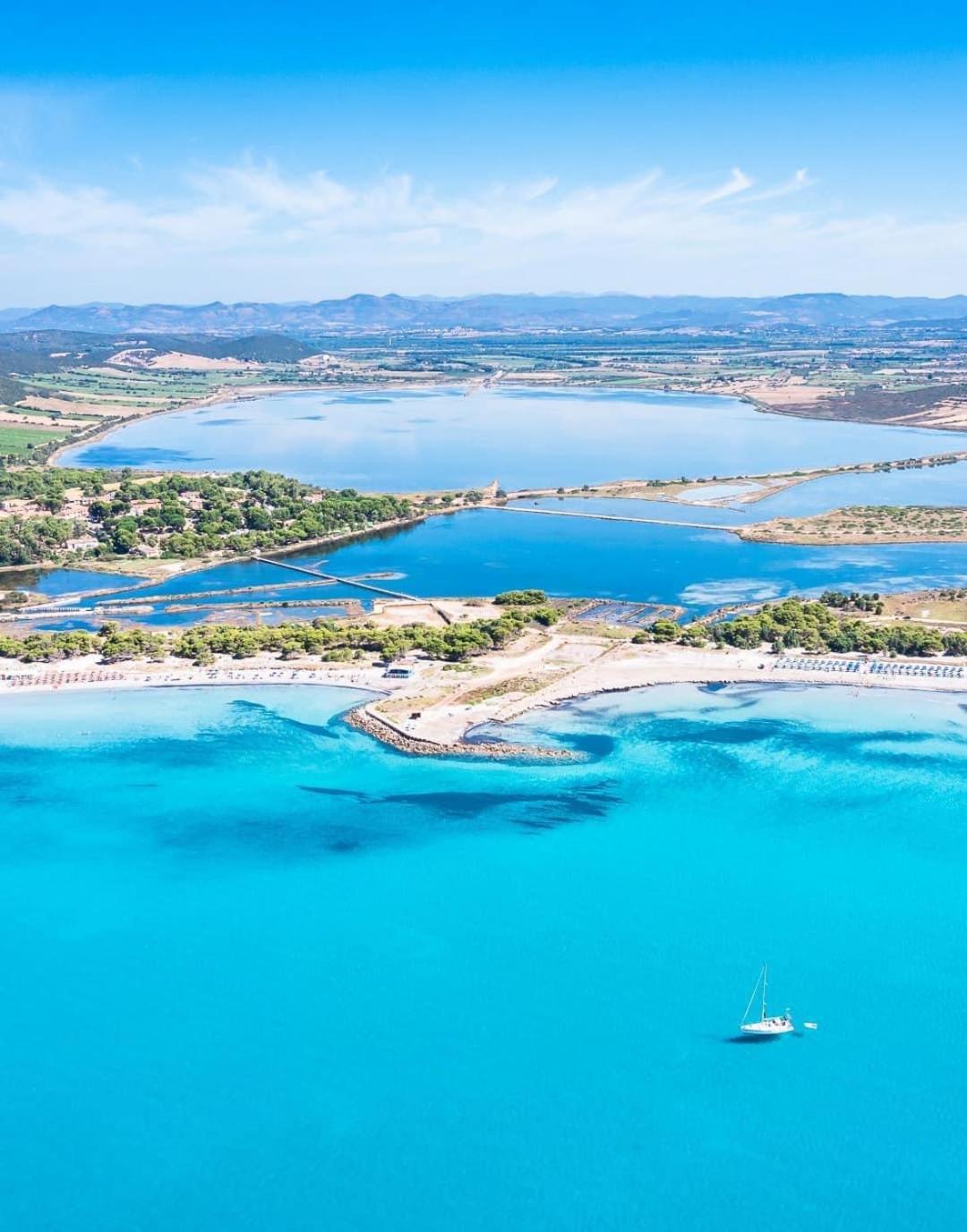 Case Vacanze "Bianco Mare" Porto Pino Exteriör bild