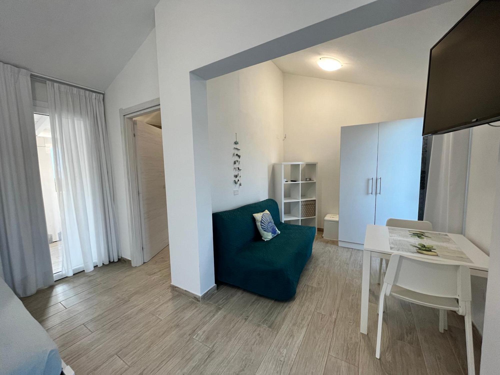 Case Vacanze "Bianco Mare" Porto Pino Exteriör bild
