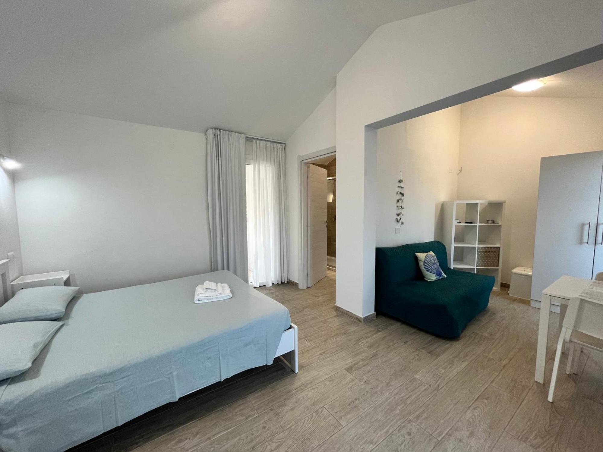 Case Vacanze "Bianco Mare" Porto Pino Exteriör bild