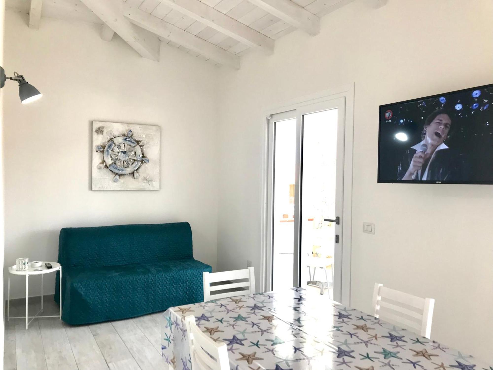 Case Vacanze "Bianco Mare" Porto Pino Rum bild