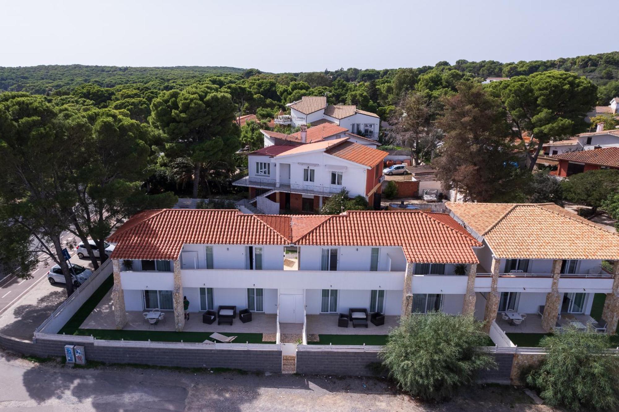 Case Vacanze "Bianco Mare" Porto Pino Exteriör bild