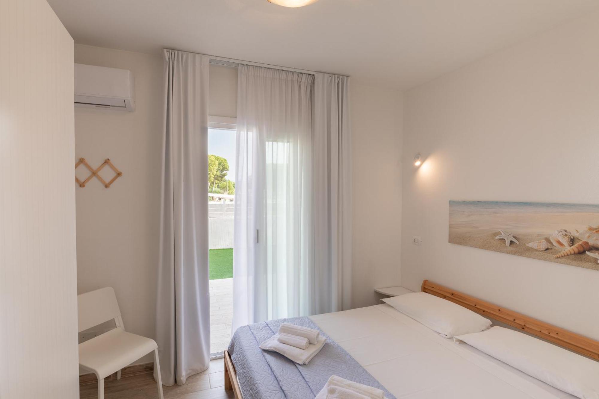 Case Vacanze "Bianco Mare" Porto Pino Rum bild