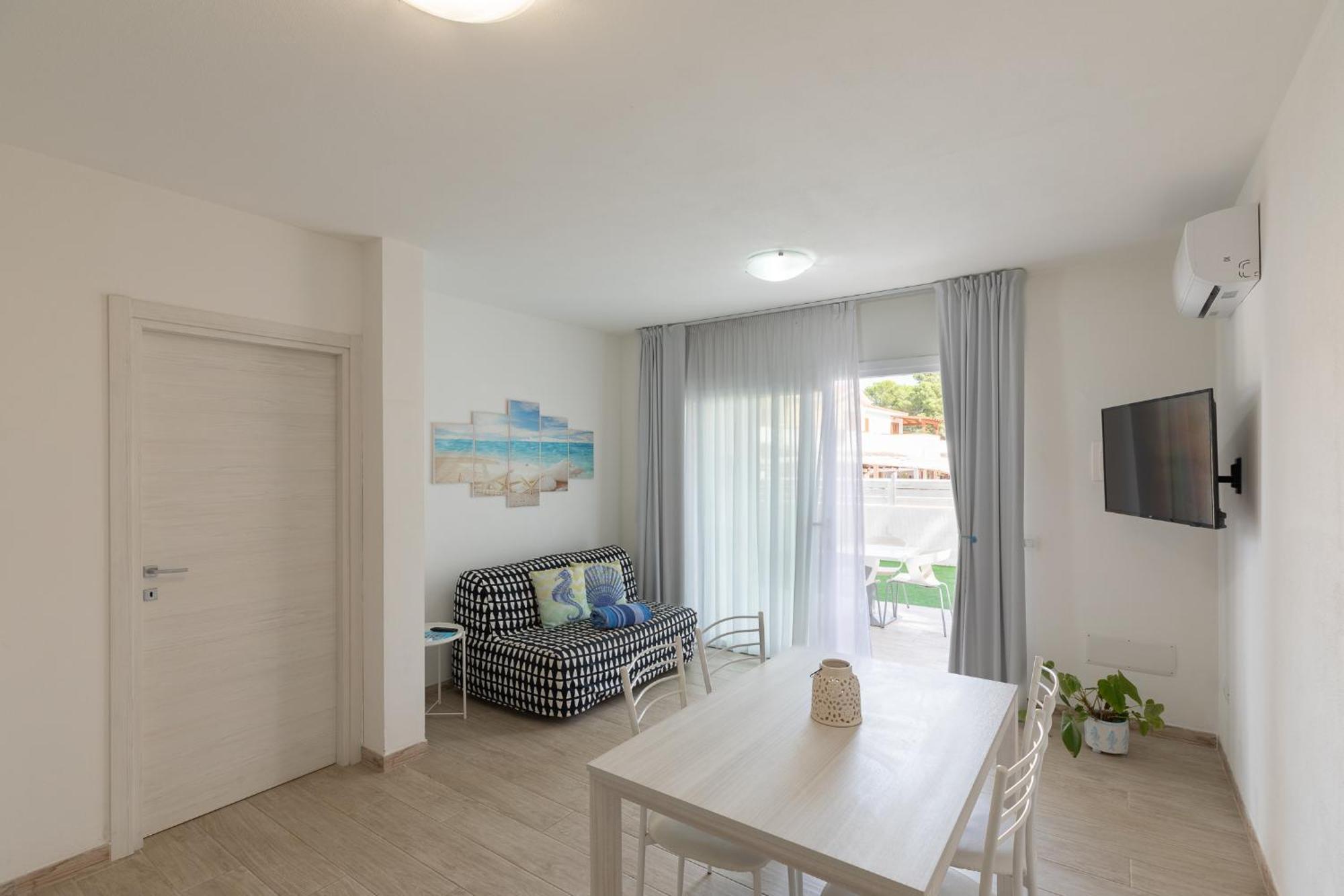Case Vacanze "Bianco Mare" Porto Pino Exteriör bild
