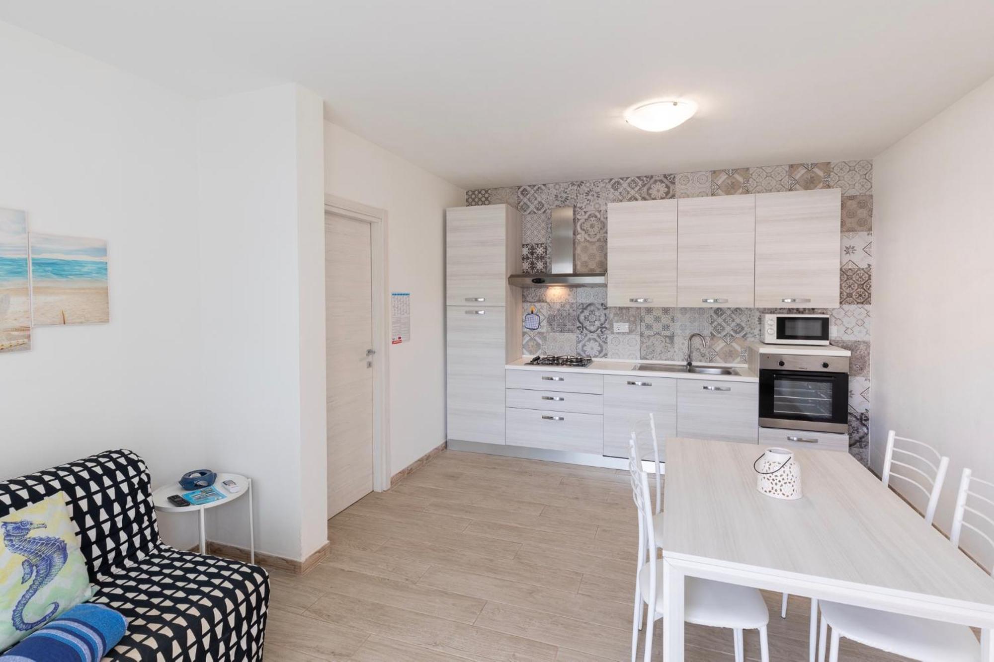 Case Vacanze "Bianco Mare" Porto Pino Rum bild
