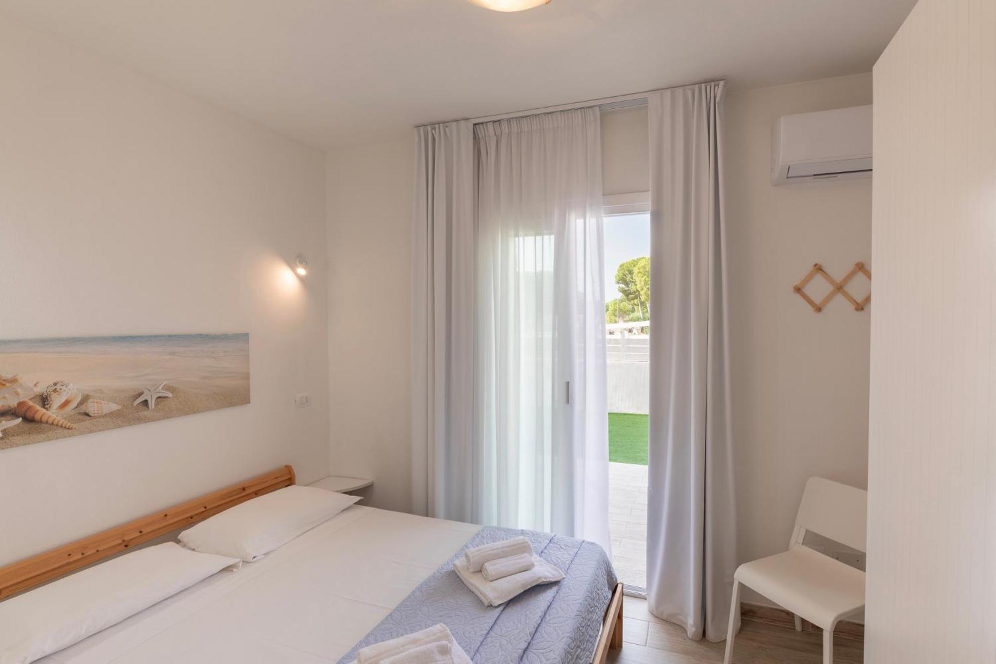 Case Vacanze "Bianco Mare" Porto Pino Rum bild