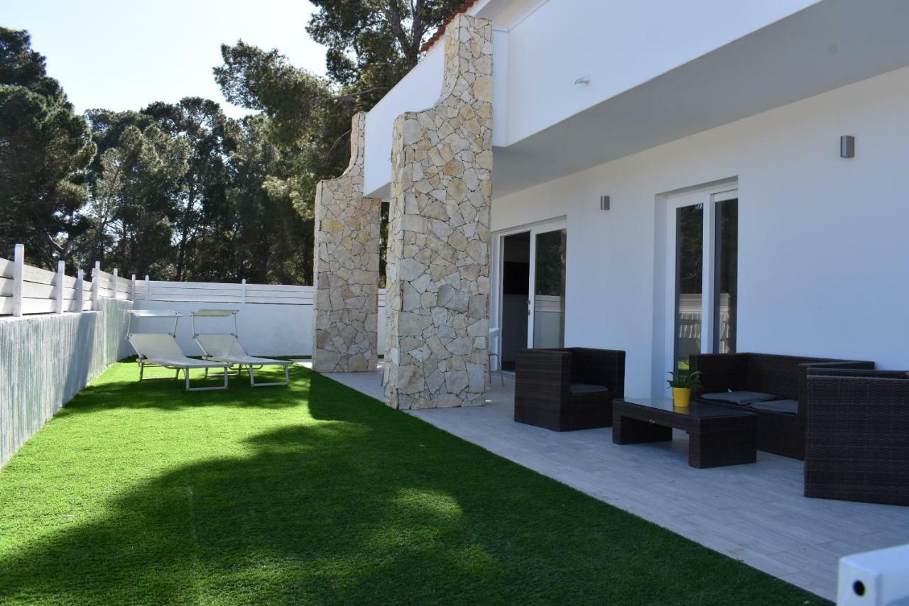 Case Vacanze "Bianco Mare" Porto Pino Exteriör bild
